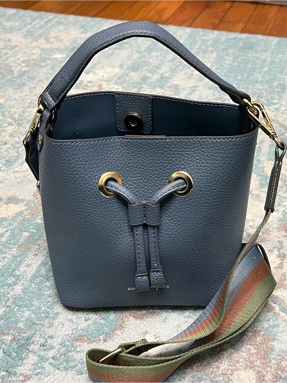 Nanette Lepore slate blue pebbled leather mini bucket bag with striped strap